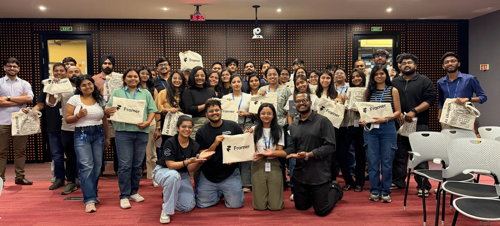 The Manifest Bengaluru crowd, organised by AI Sangathan, holding Framer and AI Sangathan tote bags